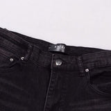 Amiri Jeans splashes ink and washes old ripped slim jeans