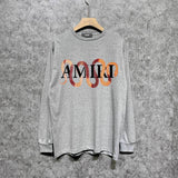 Amiri long sleeve shirts gold snake print