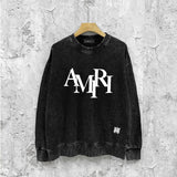 Amiri washed sweatshirt with overlapping letters and foam printing washed and distressed