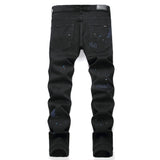 Amiri Jeans Cross Pattern Ripped Stretch Jeans