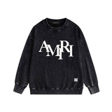 Amiri washed sweatshirt with overlapping letters and foam printing washed and distressed