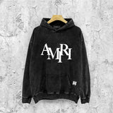 Amiri washed hoodie with overlapping letter foam printing and distressed printing