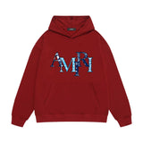Amiri hoodie cashew flower overlapping letter print