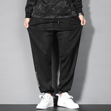 Men plus Size Fall Pants Winter Exercise Casual Pants Overweight Man Loose Camouflage Dark Flower Embroidered Slacks