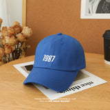 Joe Goldberg Hats1987 Embroidered Hat Men's and Women's Soft Top Curved Brim Baseball Cap Outdoor Sun-Poof Peaked Cap
